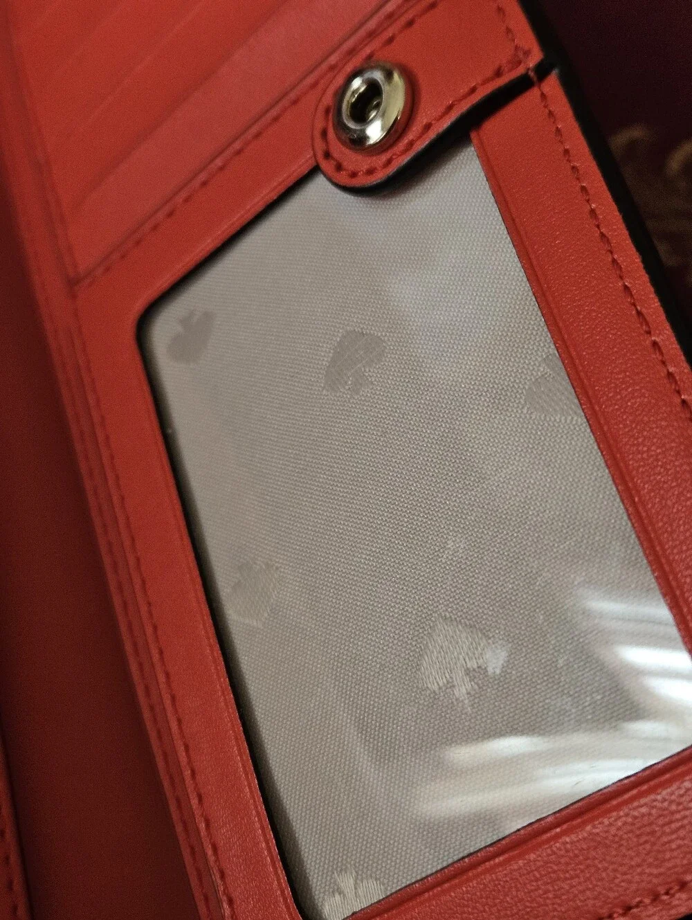 Kate Spade New York coral orange Saffiano leather continental wallet
